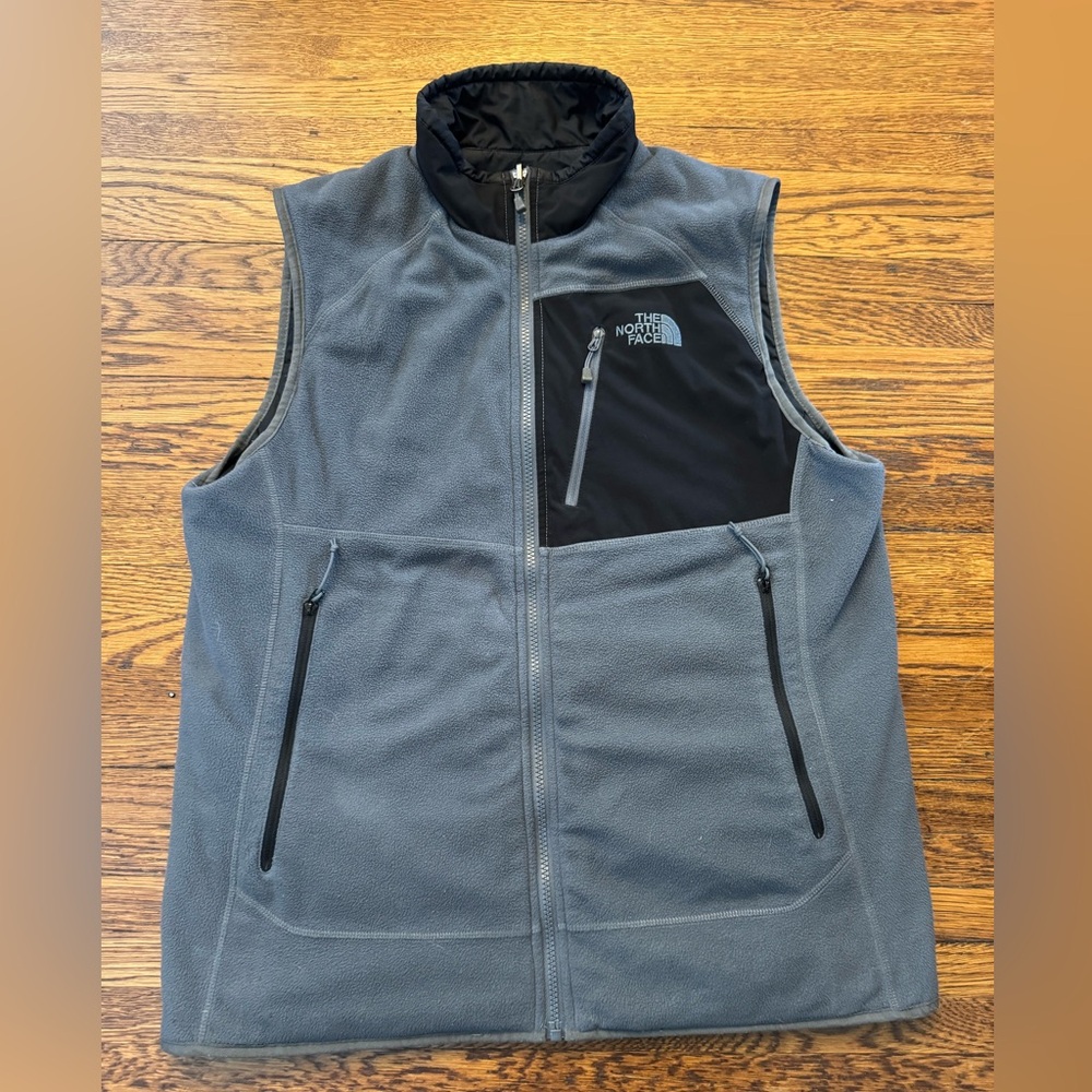 #651 The North Face Men's Gray Fleece and puffer Vest. REVERSIBLE UNIQUE COMFORT